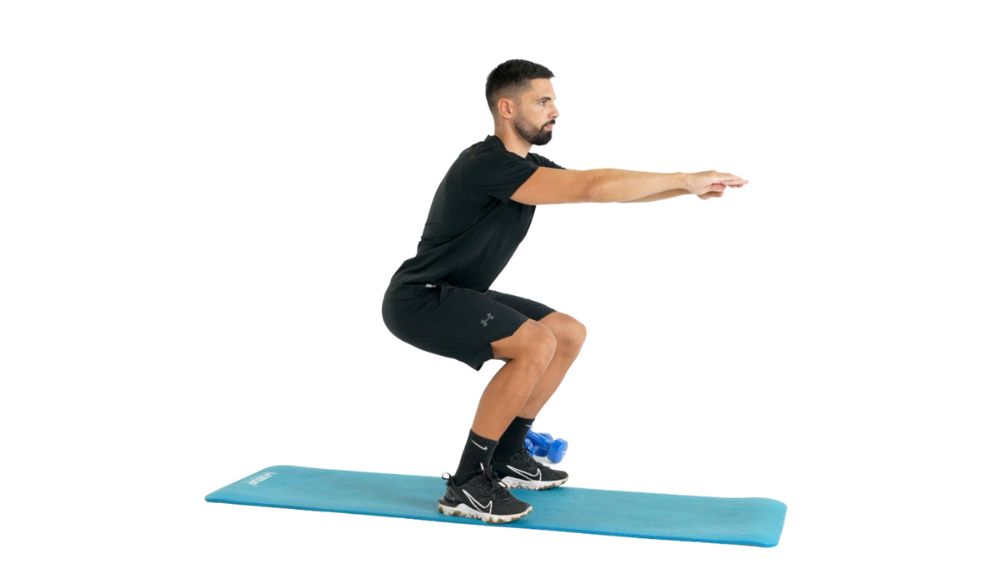 Comment réaliser l'exercice de la chaise (dans le vide)
